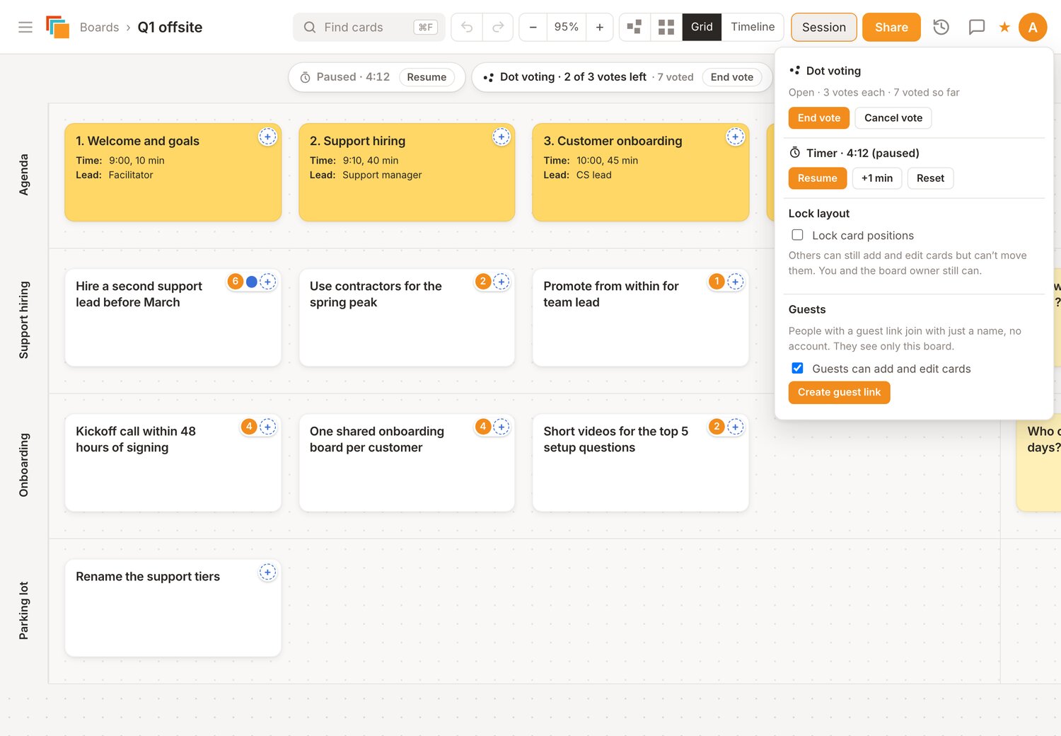 A workshop board during a session: a paused timer, an open dot vote with vote counts on the idea cards, and the Session panel with voting, timer, lock layout and guest link controls.